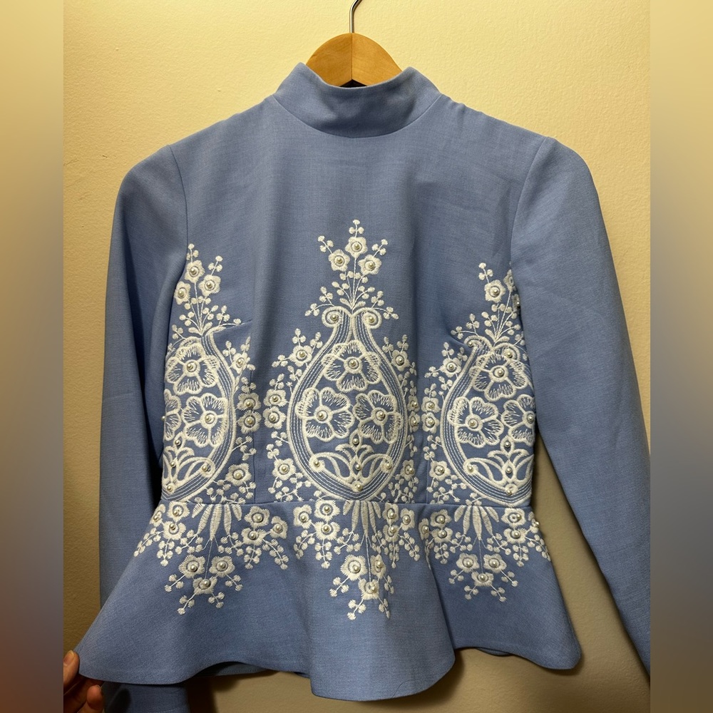 Light blue peplum top Size 38